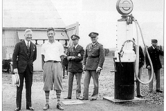Somerset Hills Airport - 1932 - Governor A. Harry Moore (left), with straw hat, arrived at the Somerset Hills Airport to visit the US Veterans Hospital at Lyons in Bernards Township.